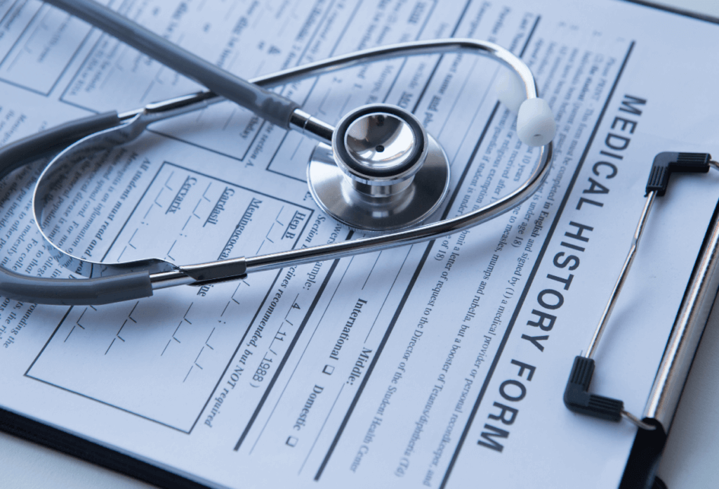 a picture of a medical health form and a doctor's stethoscope
