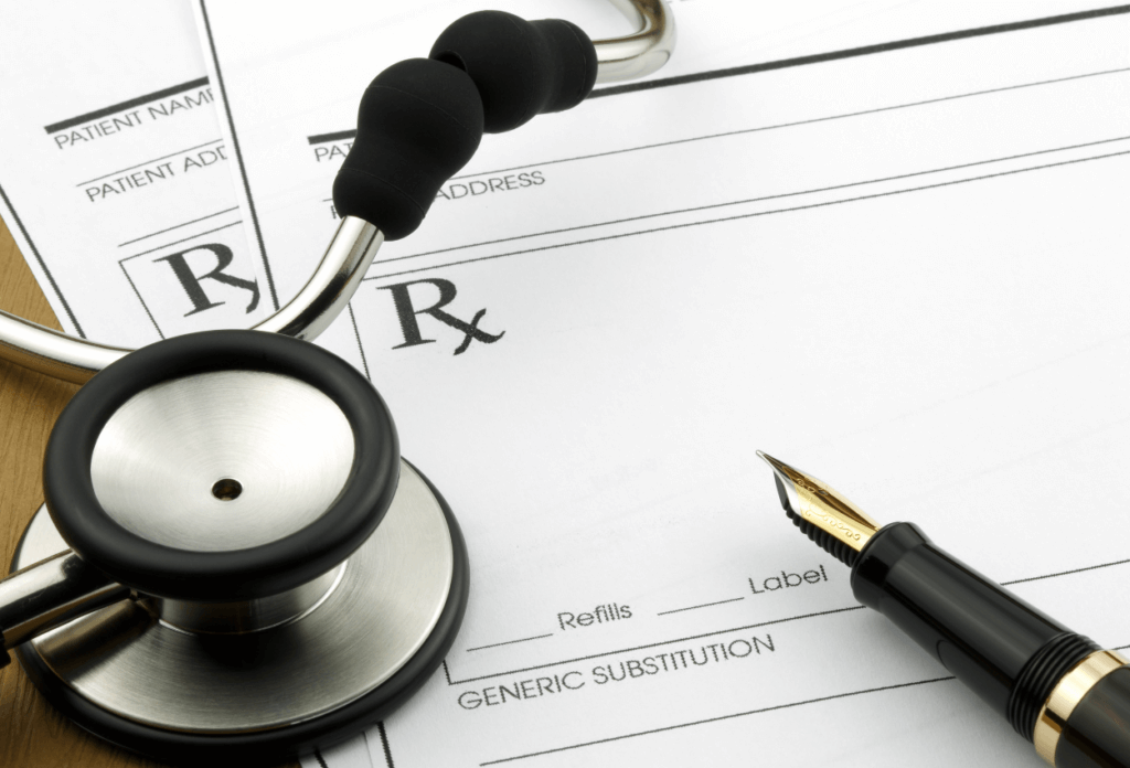 a picture of a prescription form and a doctor's stethoscope