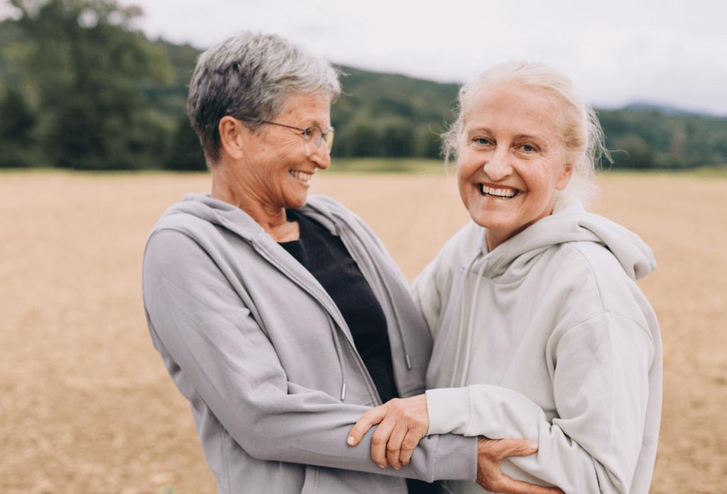 A picture of two seniors embracing.