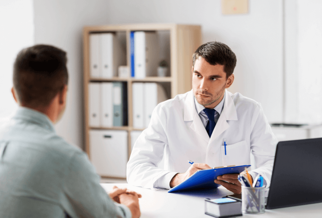 A doctor speaking with a patient