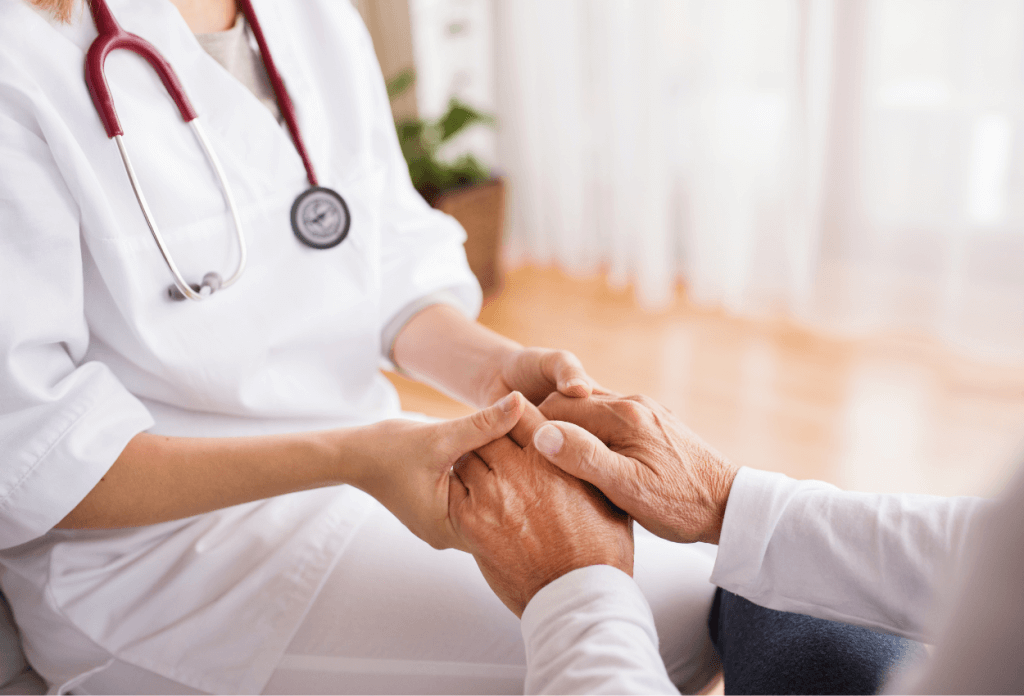 A nurse is holding hands with a male senior patient in a blog titled "Understanding Medicare for Chronic Illness: A Senior’s Path to Better Health."