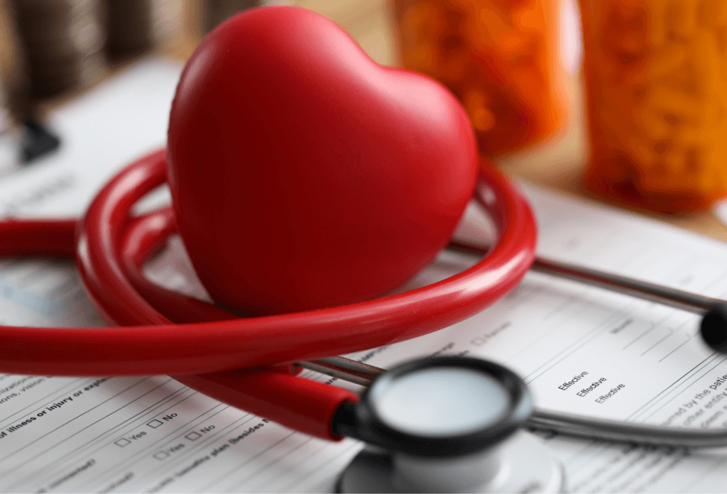 A red heart and stethoscope are pictured in an image for a blog titled "Medicare Open Enrollment 2024-2025: Your Guide to Making the Right Choice."